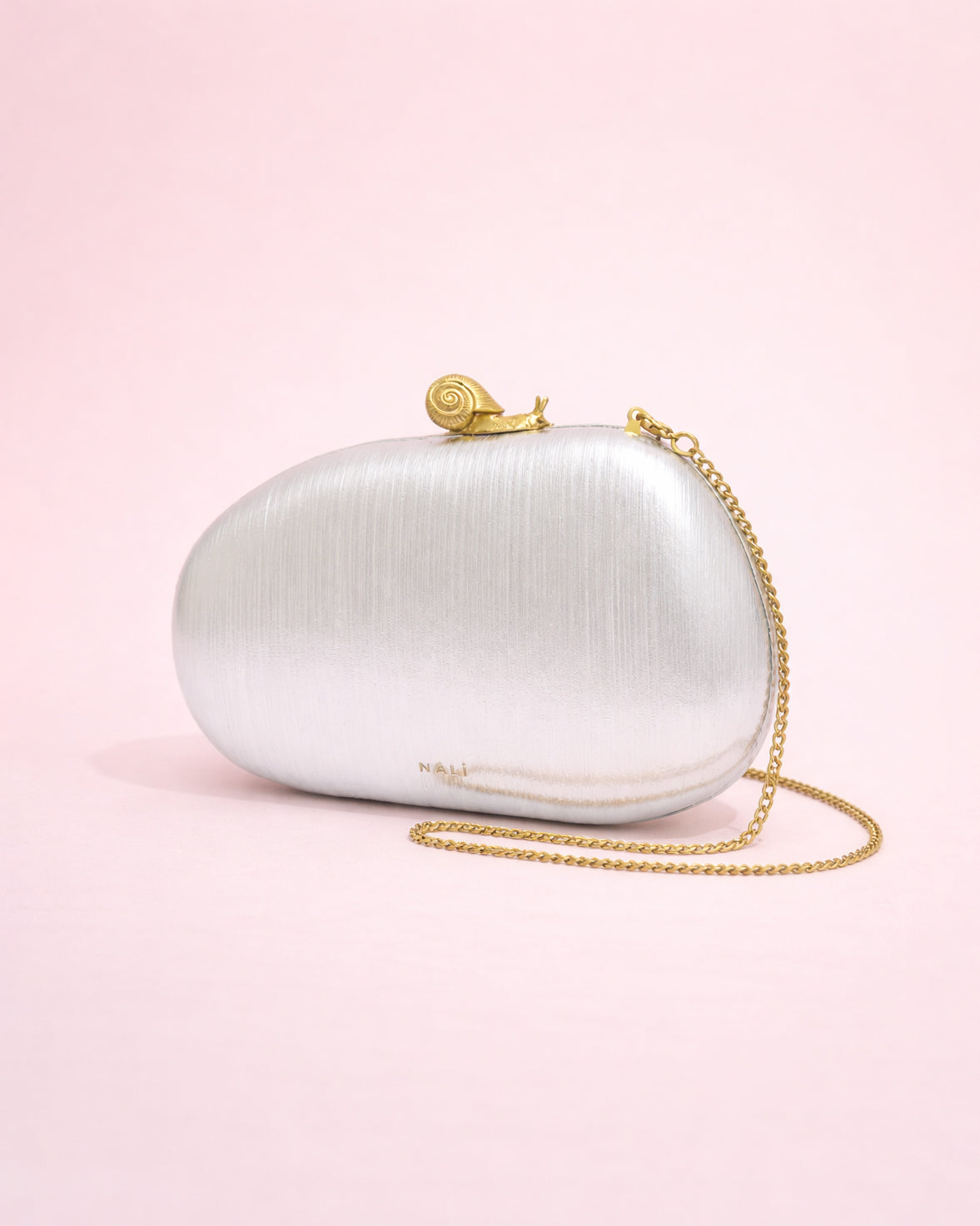 Bella - Clutch ivoire à fermeture escargot