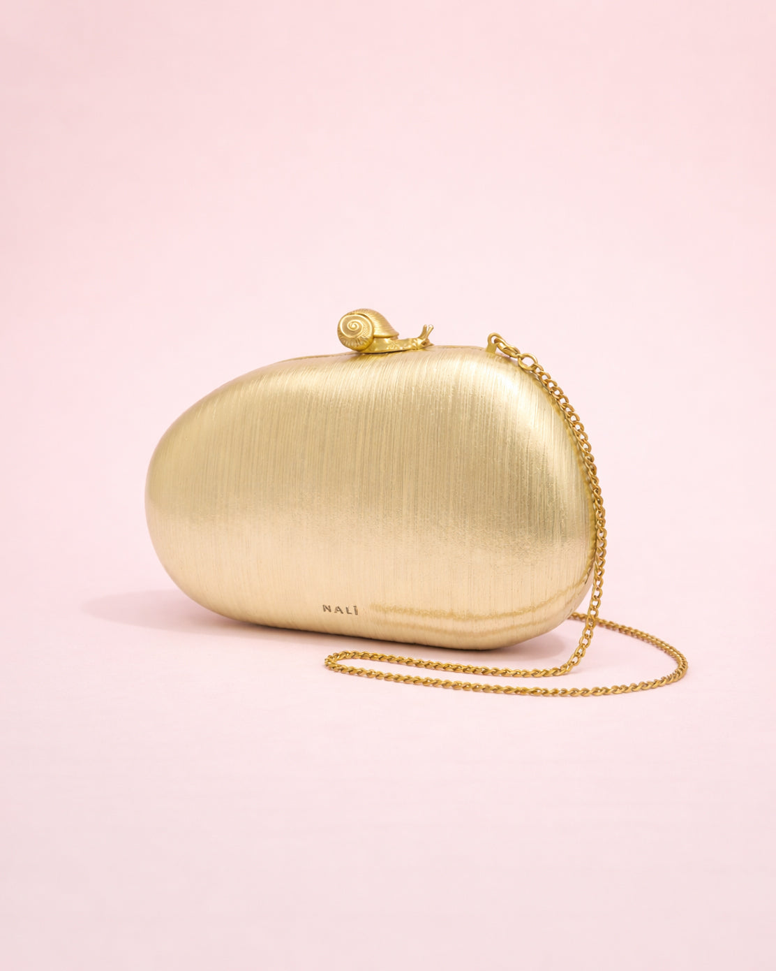 Bella - Clutch doré à fermeture escargot
